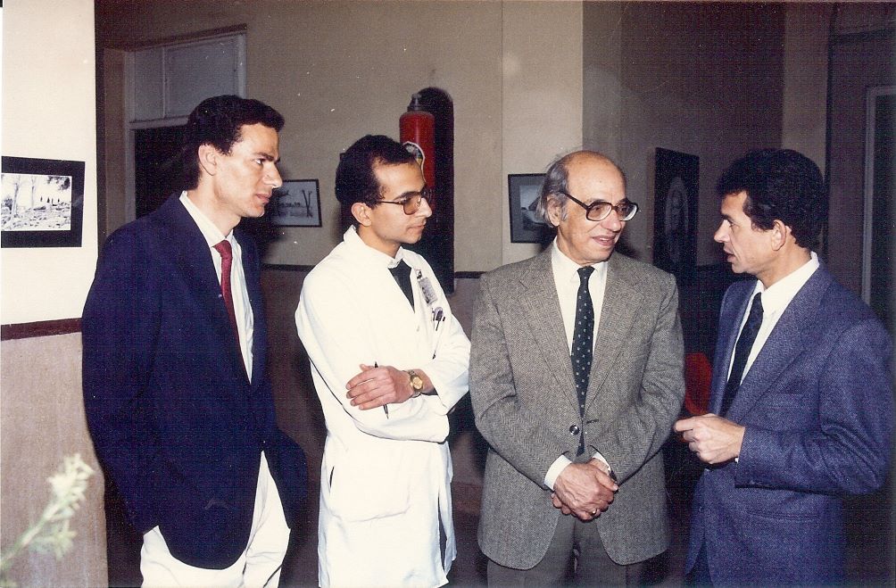 Dr Ahmad Khalil welcomes to his art exhibition in Cairo University Hospital: Professor Ali El-Mofti, and renowned artist Hussein Picar best known portrait artist with Ibrahim Ghazala